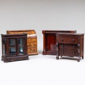 GROUP OF FOUR MINIATURE SALESM