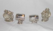 Group of Four Napkin Rings,  c