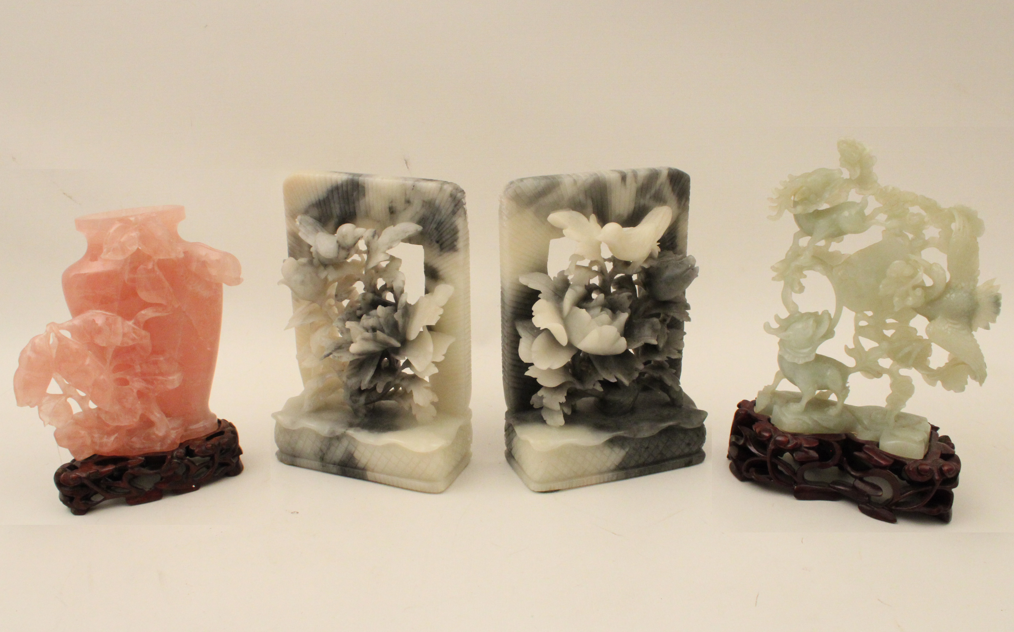GROUP OF FOUR ORIENTAL CARVINGS