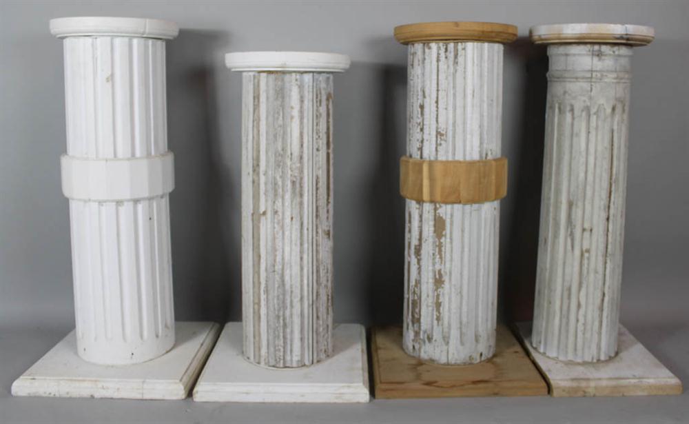 GROUP OF FOUR PAINTED WOODEN FLUTED