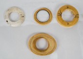 GROUP OF FOUR POLISHED BONE BA