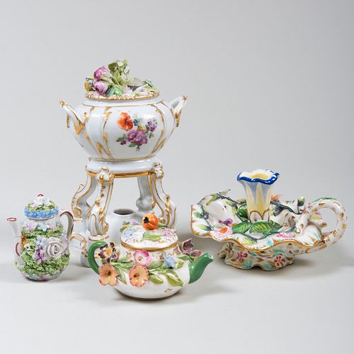 GROUP OF FOUR PORCELAIN FLOWER