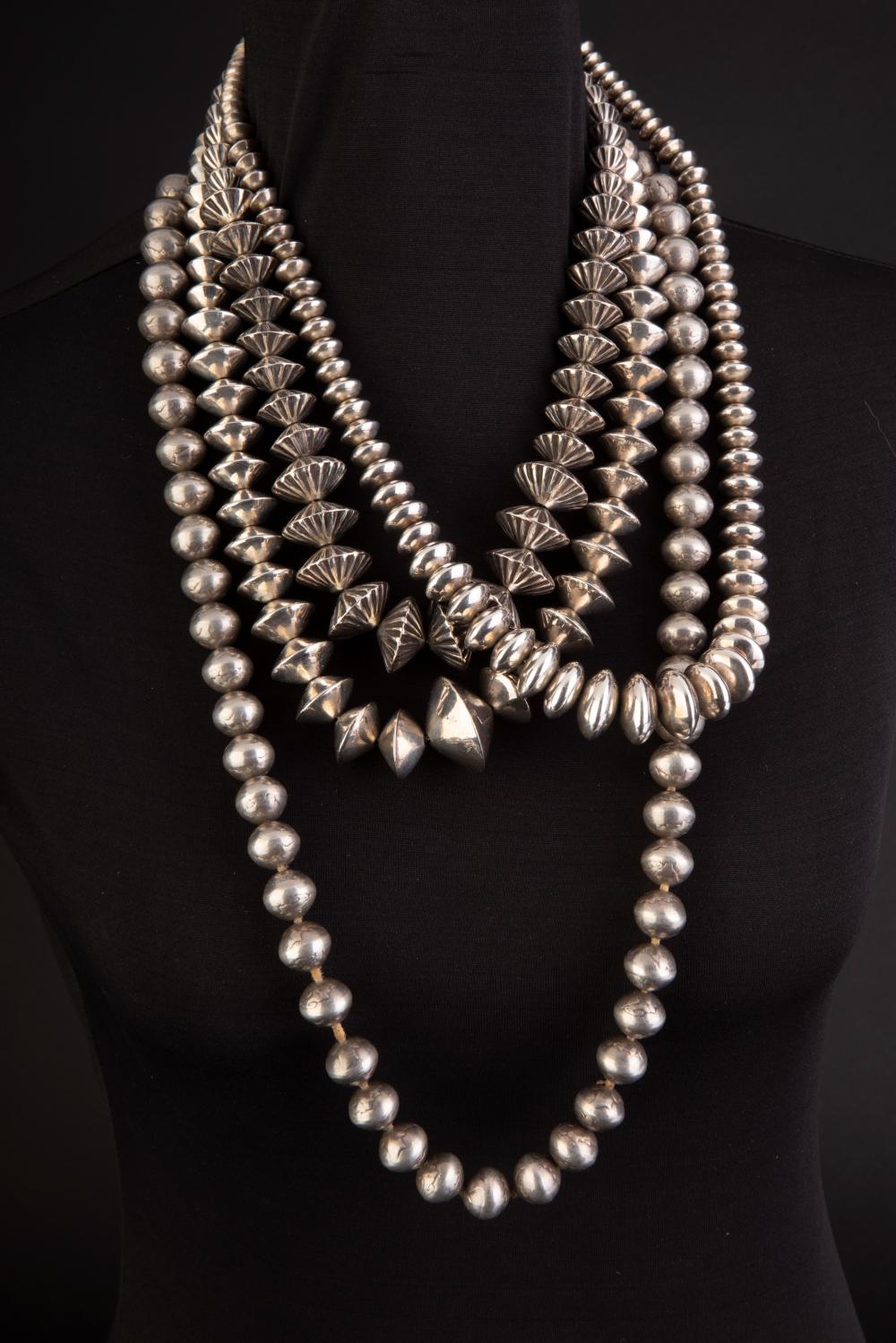 GROUP OF FOUR SILVER NECKLACES: