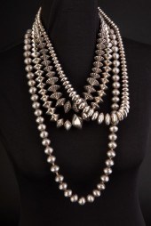 GROUP OF FOUR SILVER NECKLACES