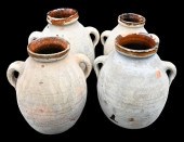GROUP OF FOUR STONEWARE HANDLE