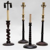 GROUP OF FOUR TURNED WOOD CAND
