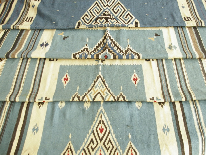 Group of Four Woven Rugs,  in the