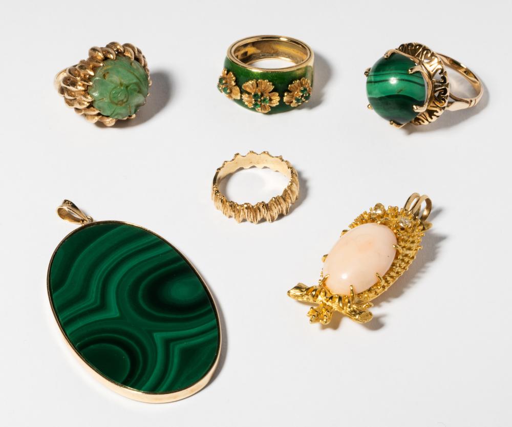 GROUP OF FOUR YELLOW GOLD RINGS AND