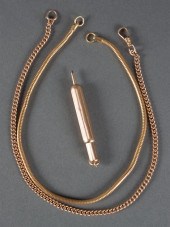 Group of gold jewelry and acce