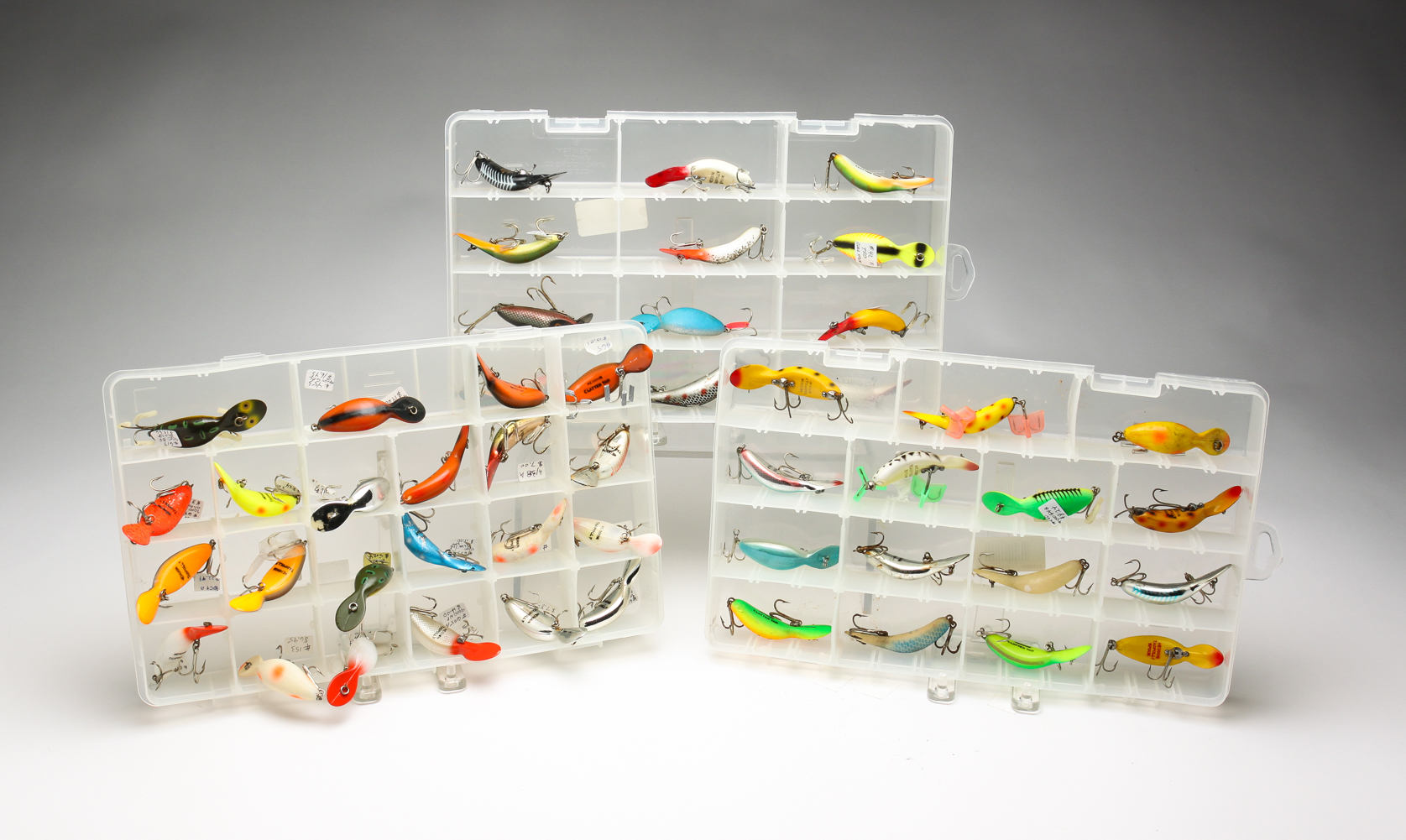 GROUP OF HEDDON FISHING LURES. Late