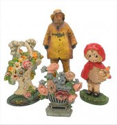 GROUP OF IRON DOORSTOPS, TO IN