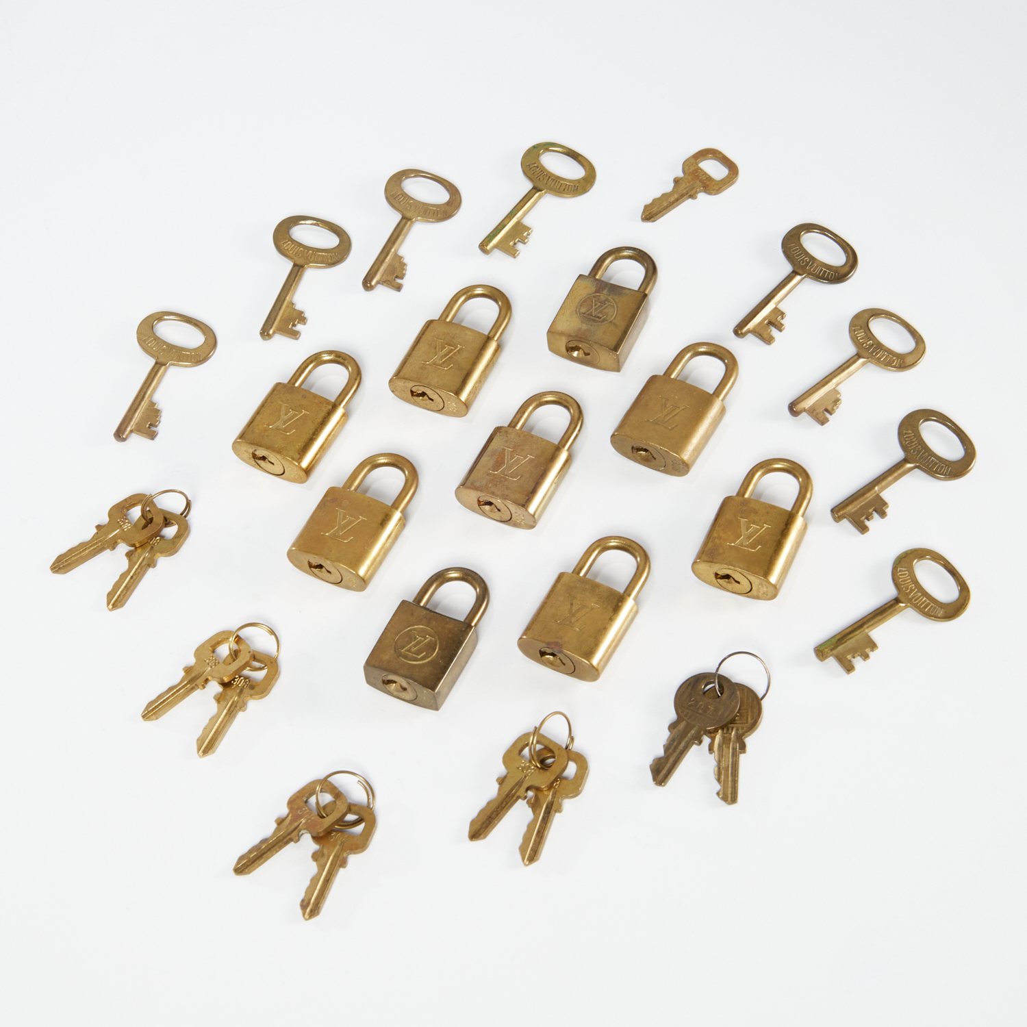 GROUP OF LOUIS VUITTON LOCK & KEY