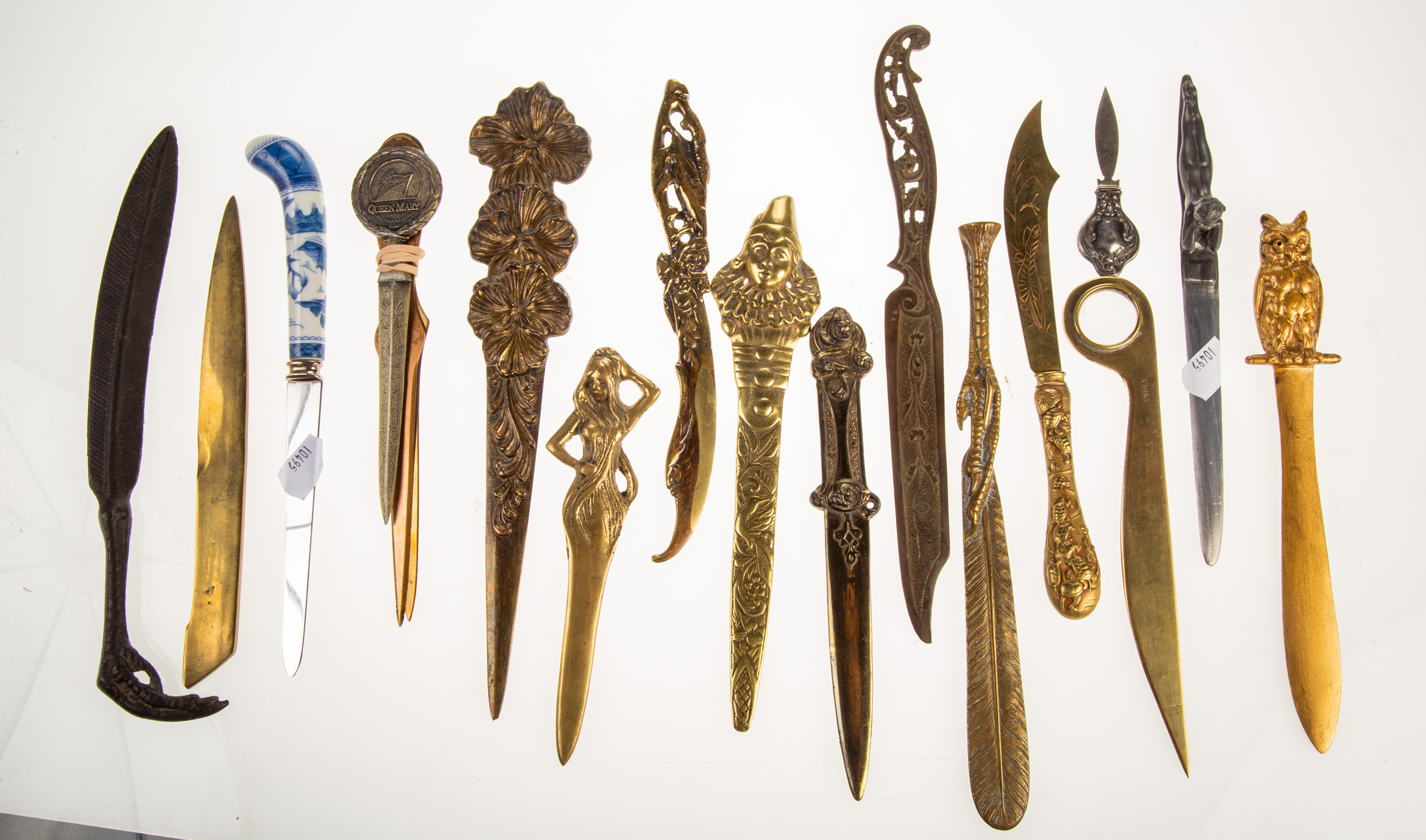 GROUP OF METAL LETTER OPENERS .