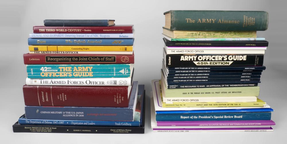 GROUP OF MILITARY POLICY BOOKS