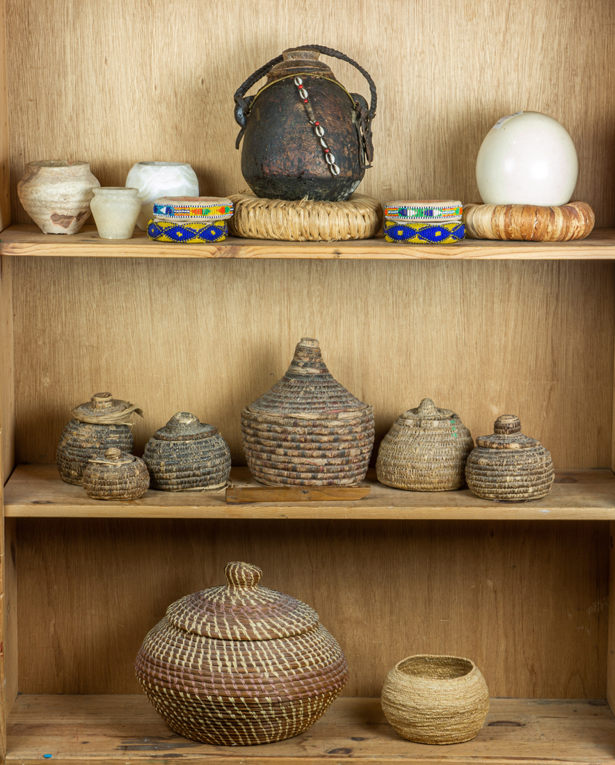 GROUP OF MOSTLY AFRICAN COVERED