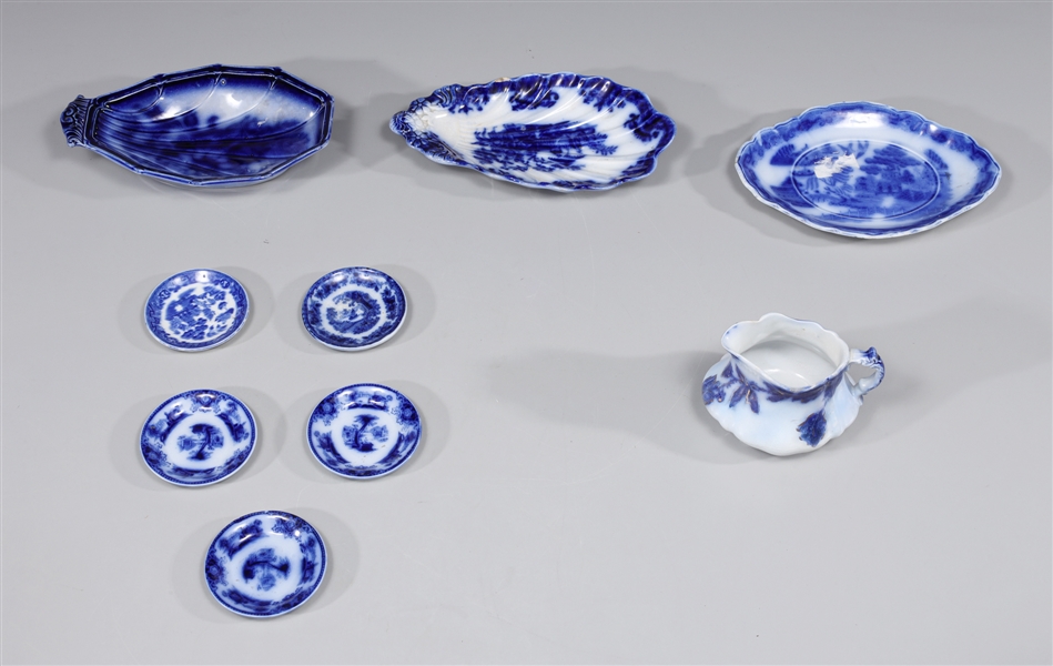 Group of nine antique flow blue