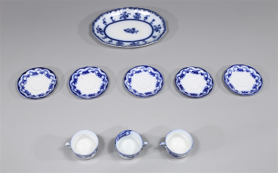 Group of nine antique flow blue New