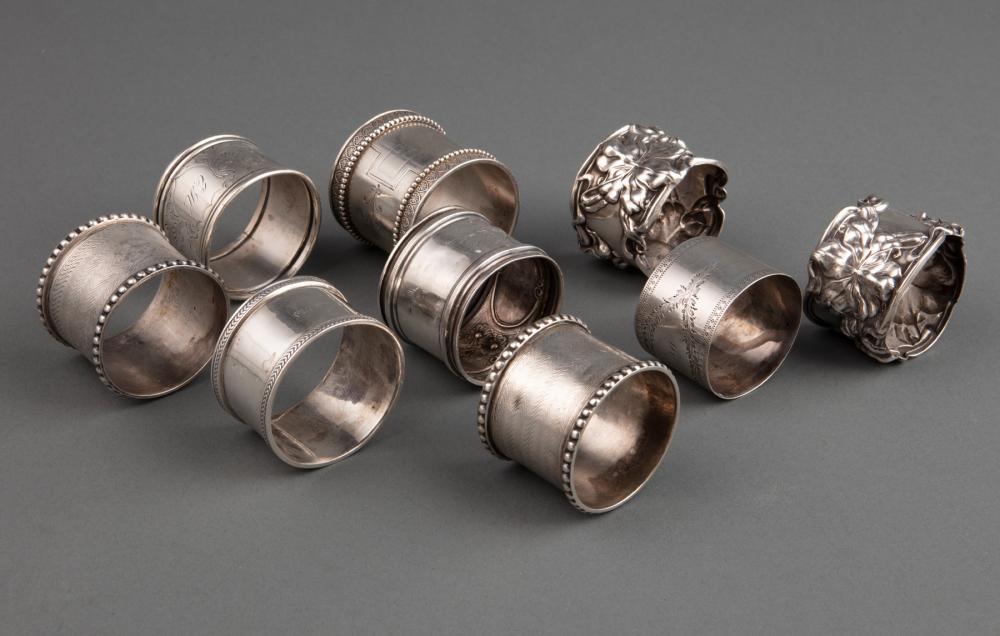 GROUP OF NINE ANTIQUE SILVER NAPKIN