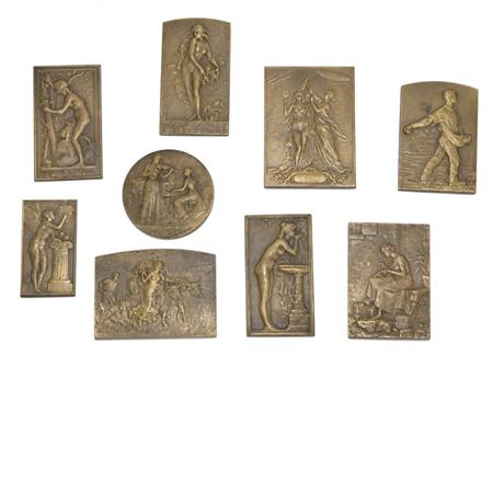 Group of Nine Gilt Bronze Plaques