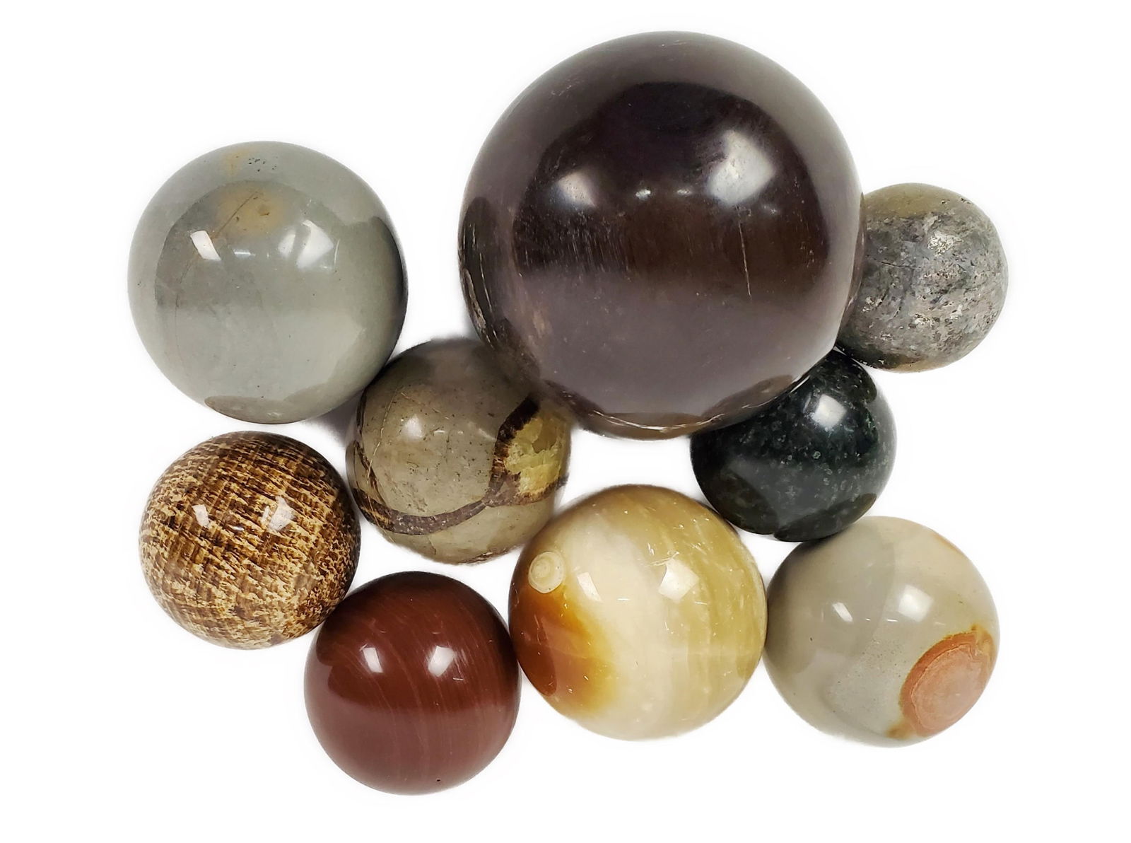 GROUP OF NINE POLISHED STONE