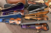 GROUP OF NINE VIOLINS WITH CAS