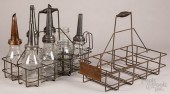 GROUP OF OIL BOTTLES WITH RACK