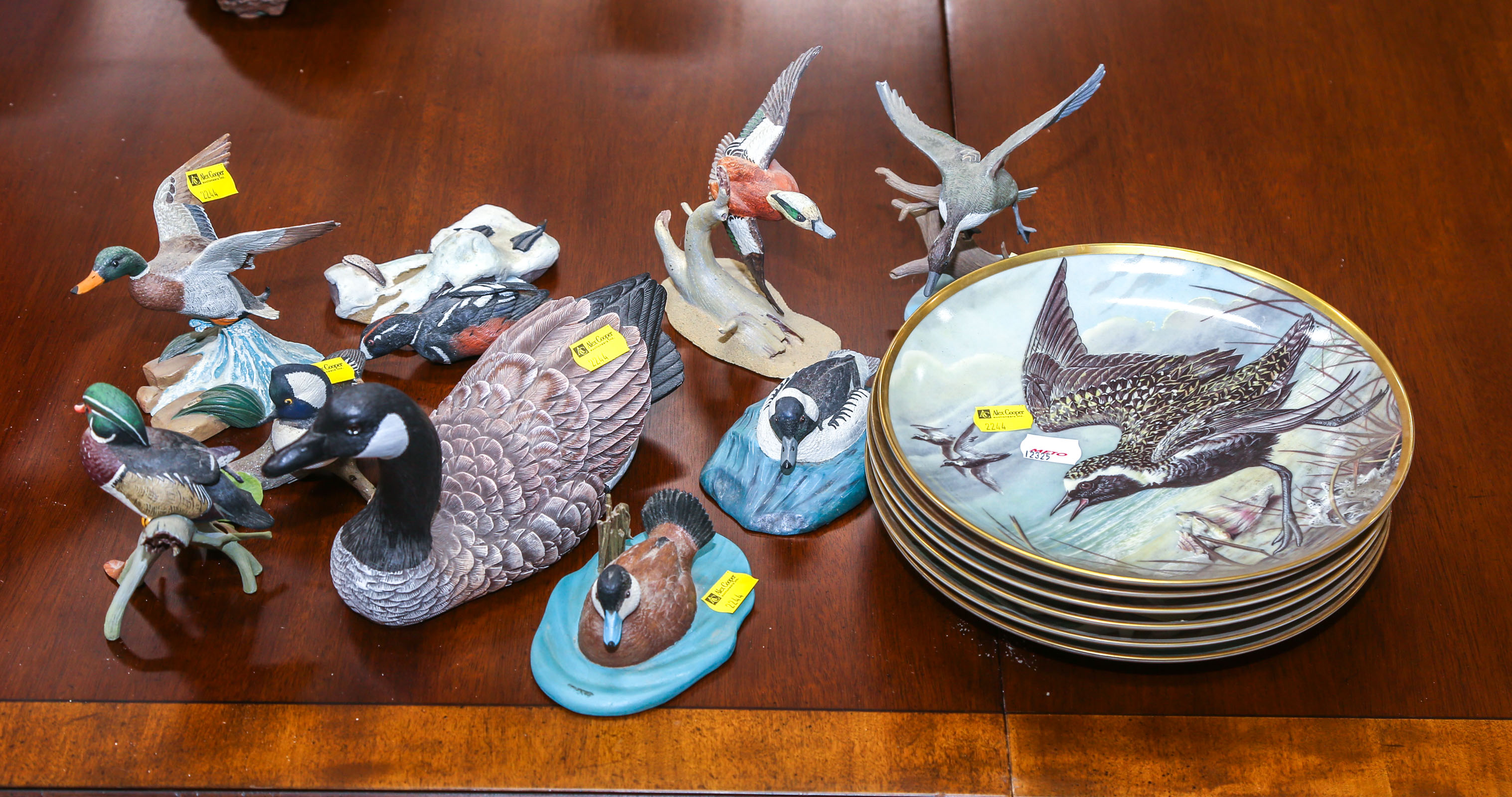 GROUP OF PAINTED RESIN BIRDS;