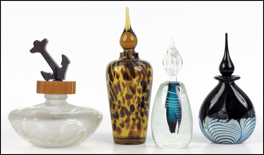 GROUP OF PERFUME BOTTLES. Comprised