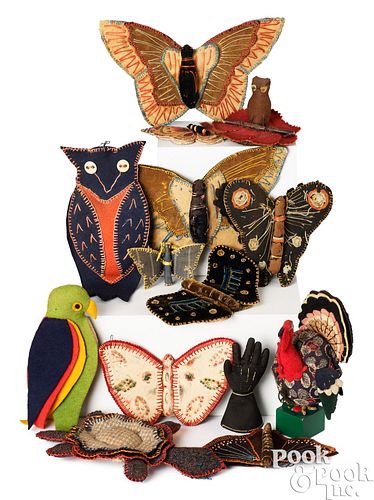 GROUP OF PIN CUSHIONS AND NEEDLE