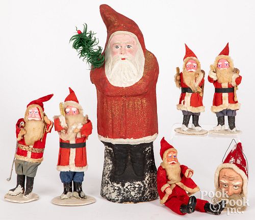 GROUP OF SANTA CLAUS FIGURES,