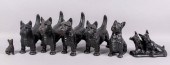GROUP OF SEVEN CAST IRON SCOTT