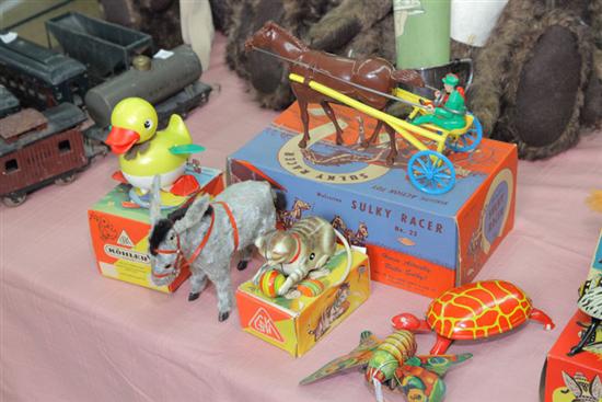 GROUP OF SEVEN MECHANICAL TOYS.