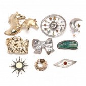 GROUP OF SILVER BROOCHES Two s