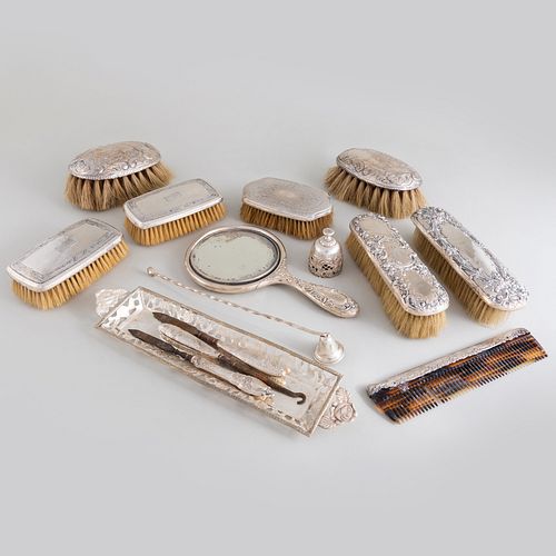 GROUP OF SILVER BRUSHES AND