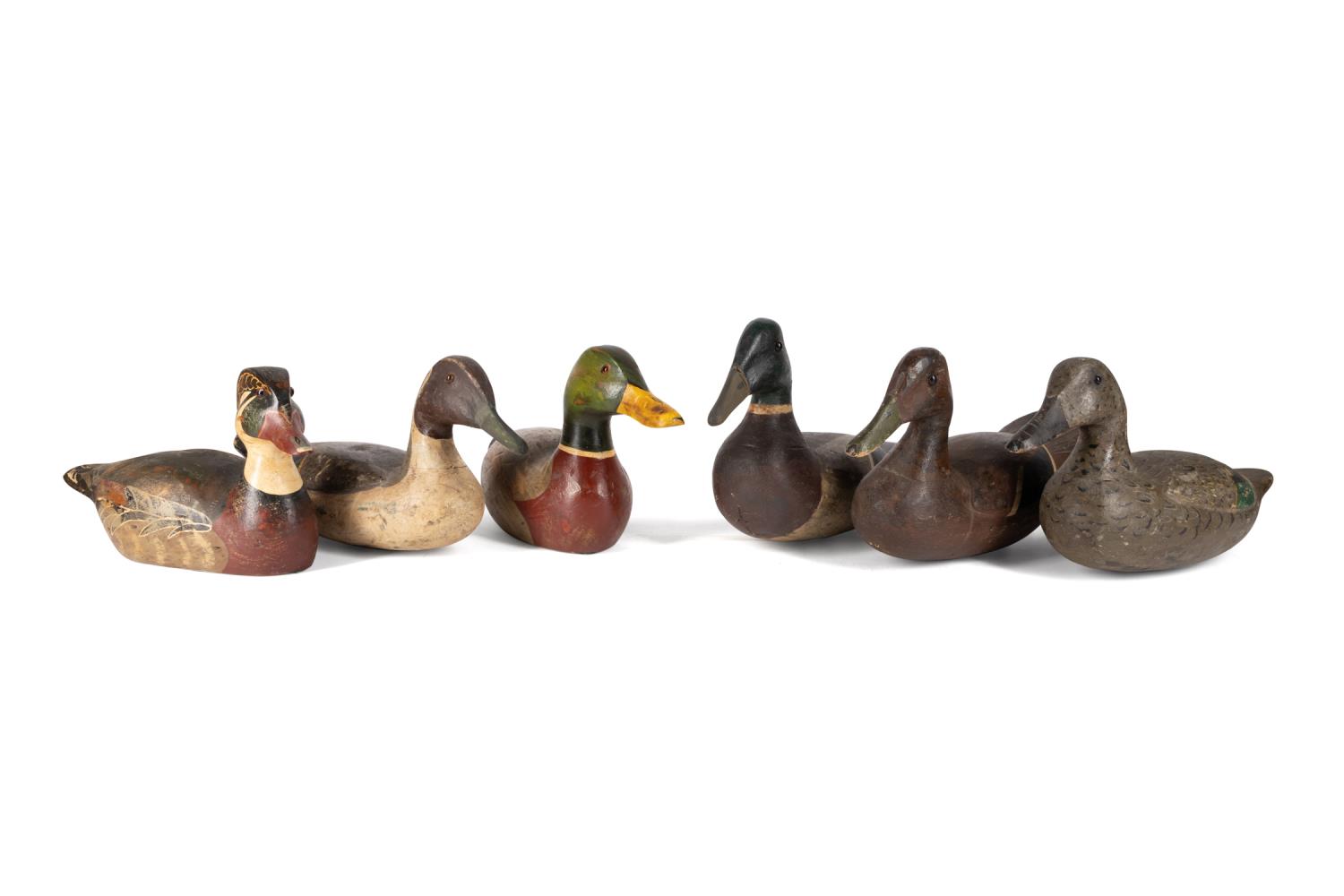GROUP OF SIX CARVED DECORATIVE DUCK
