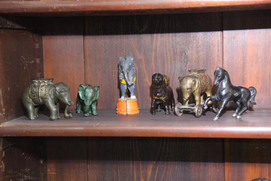 GROUP OF SIX CAST IRON STILL BANKS.
