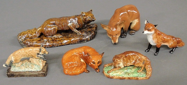 Group of six ceramic foxes to