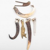 GROUP OF SIX CIGAR CUTTERSComp