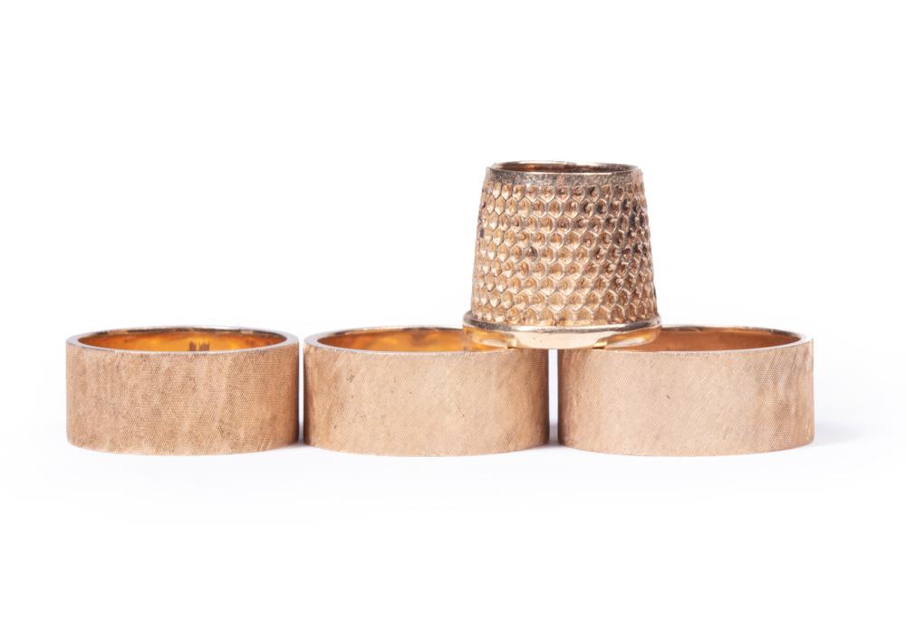 GROUP OF THREE 14 KT. YELLOW GOLD