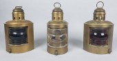 GROUP OF THREE ANTIQUE BRASS P