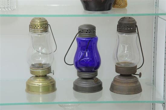 GROUP OF THREE BRASS SKATER'S