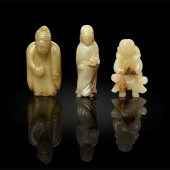 GROUP OF THREE JADE FIGURES
QI