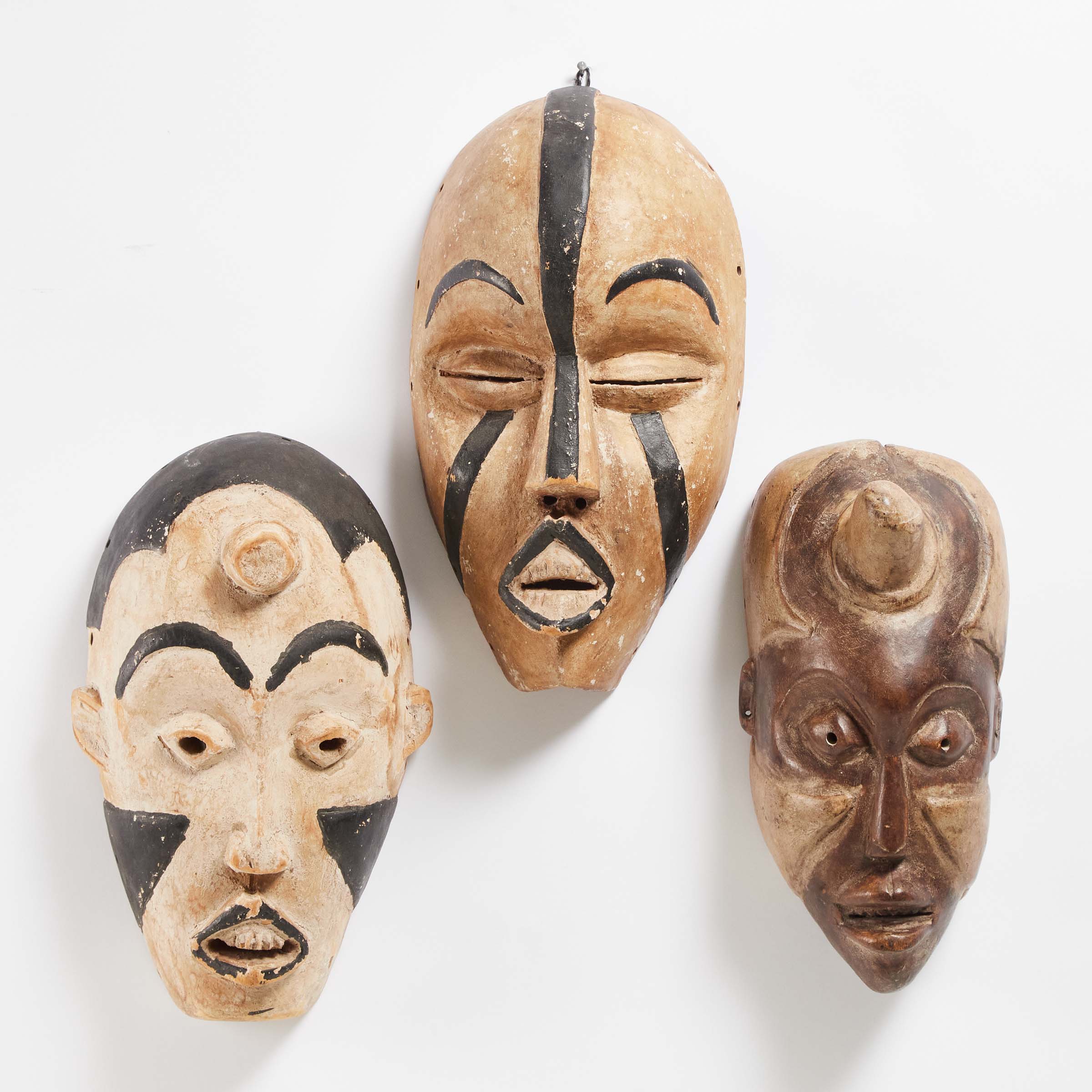 Group of Three Kongo Masks,
