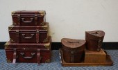 GROUP OF THREE LEATHER MOUNTED