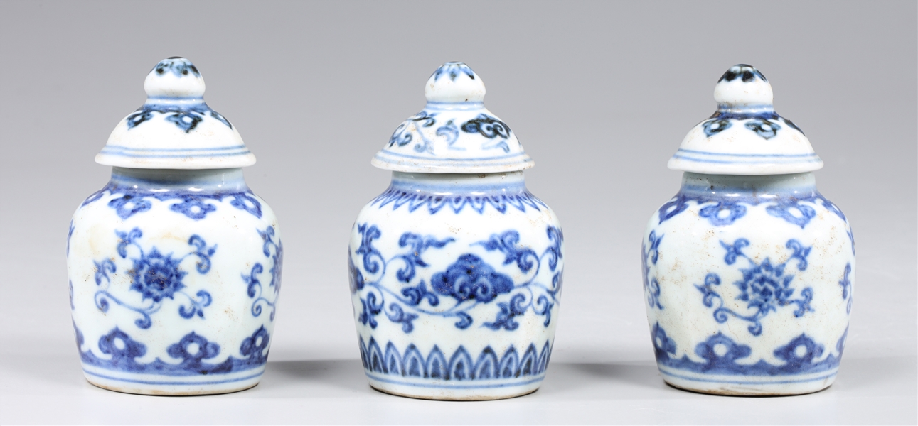 Group of three miniature blue and