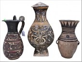 GROUP OF THREE POTTERY URNSGro