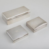 GROUP OF THREE SILVER CIGARETT