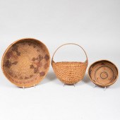 GROUP OF THREE WOVEN BASKETSCo