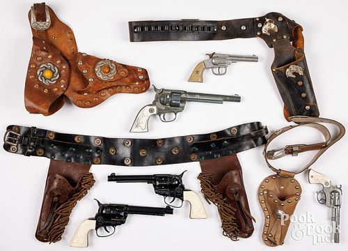 GROUP OF TOY CAP GUNS WITH HOLSTERS