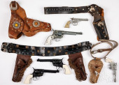 GROUP OF TOY CAP GUNS WITH HOL